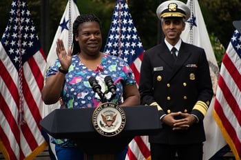 A nurse from the PICU at Children's National Hospital introduces Vice President Kamala Harris in the Healing Garden