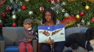 First Lady Michelle Obama visits and reads with children in 2015