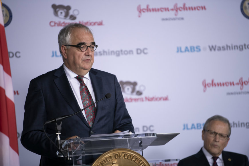 Paul Stoffels, M.D., Chief Scientific Officer and Vice Chairman of the Executive Committee at Johnson & Johnson speaks from the podium during the news conference.