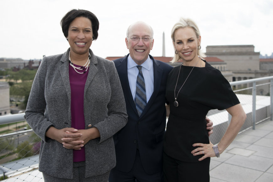 Washington D.C. Mayor Muriel Bowser, Children's National CEO & President Kurt Newman, M.D., and Johnson & Johnson Global Head of Innovation Melinda Richter pose for a photo on a rooftop.