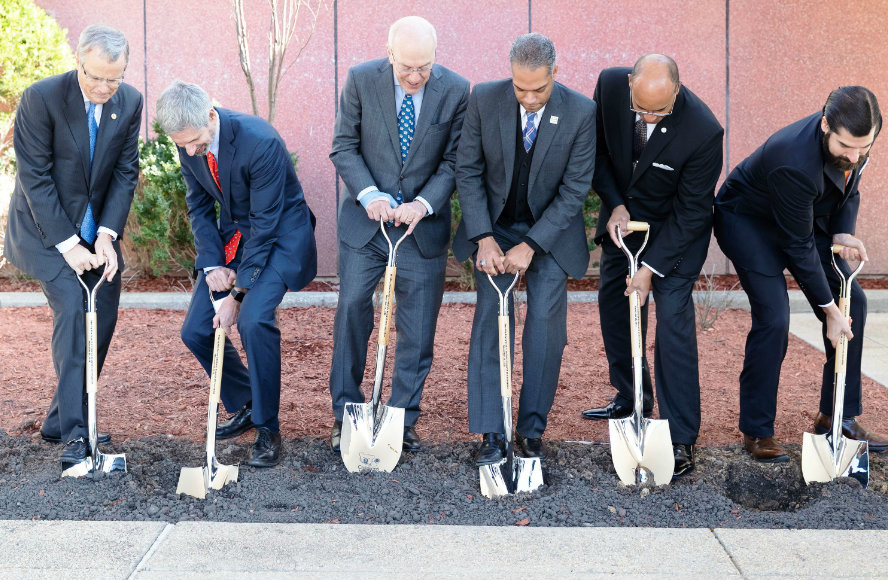 Digging into the new site, Children's National and city council leaders break ground ceremoniously.