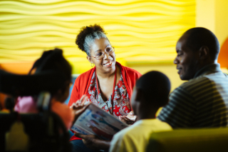 Woman sitting in a support group for families