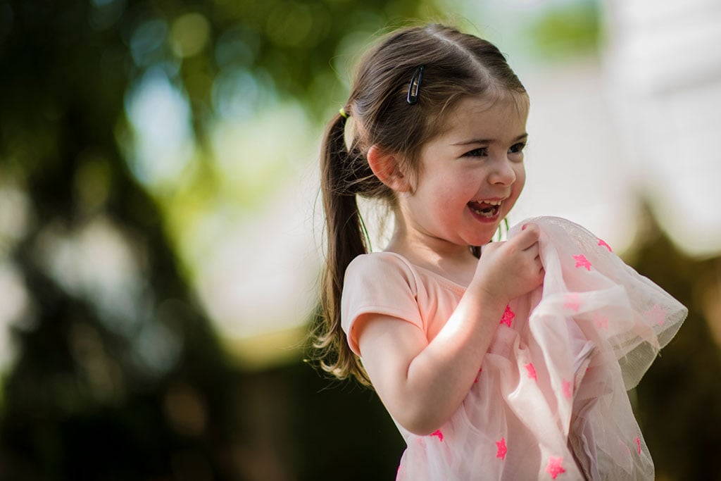 young girl laughing