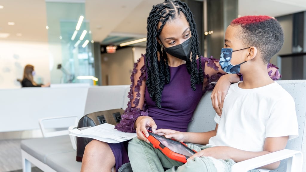 mother and son in waiting room