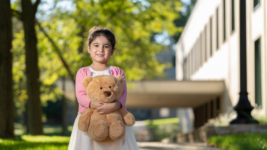 Little girl outside Shepherd Park