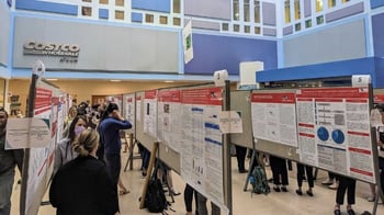 Poster sessions at the Costco Wholesale Atrium during REI Week 2023.