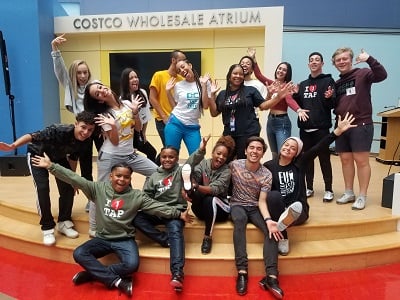 Members of a tap dancing group gather on the stage in the Costco Wholesale Atrium at Children's National Hospital