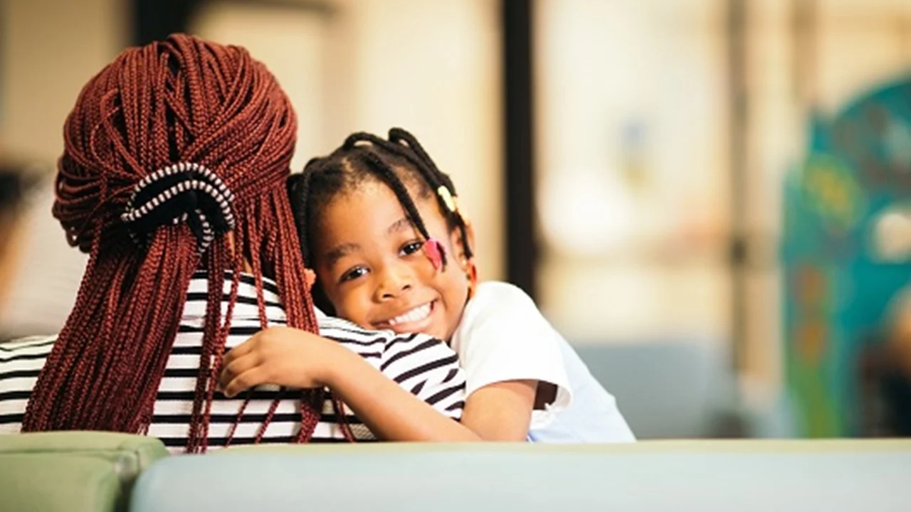 Patient and mother waiting in lobby