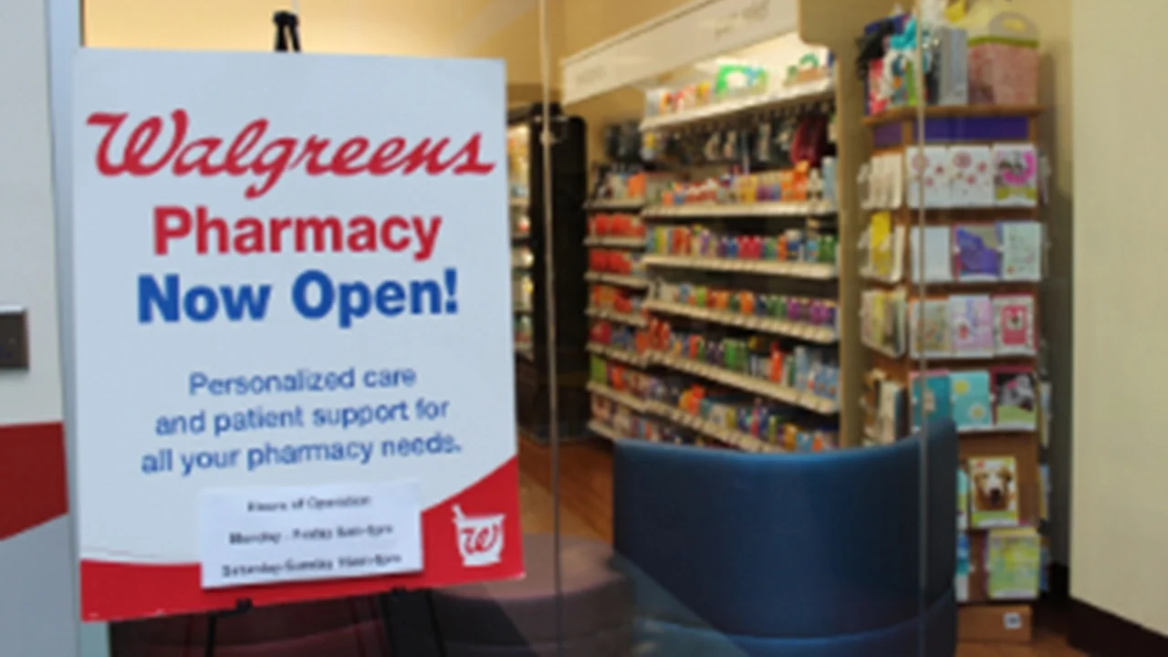 Walgreens Pharmacy sign with stocked shelves in background