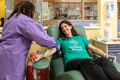 Donor giving blood