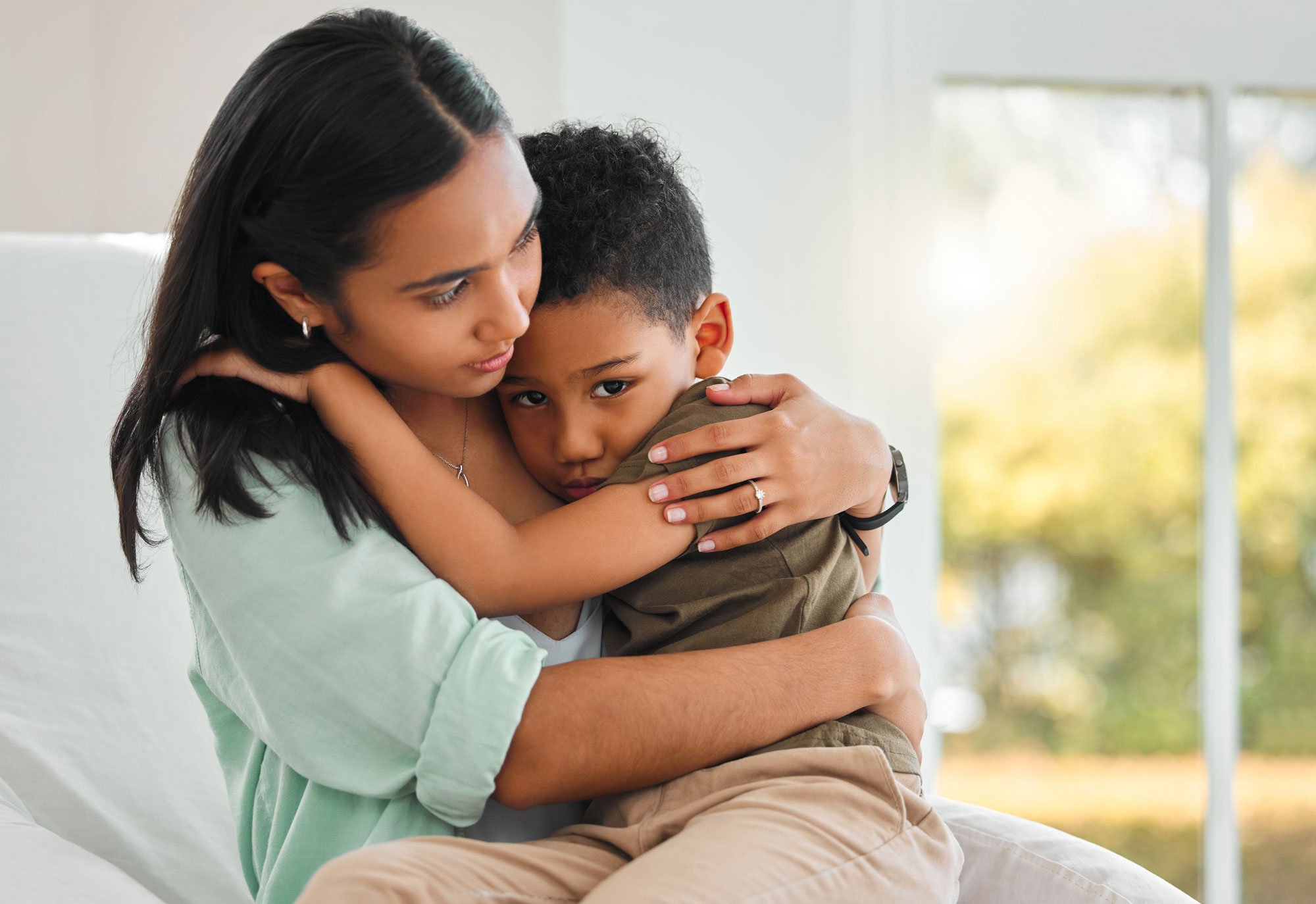 Mom hugging son