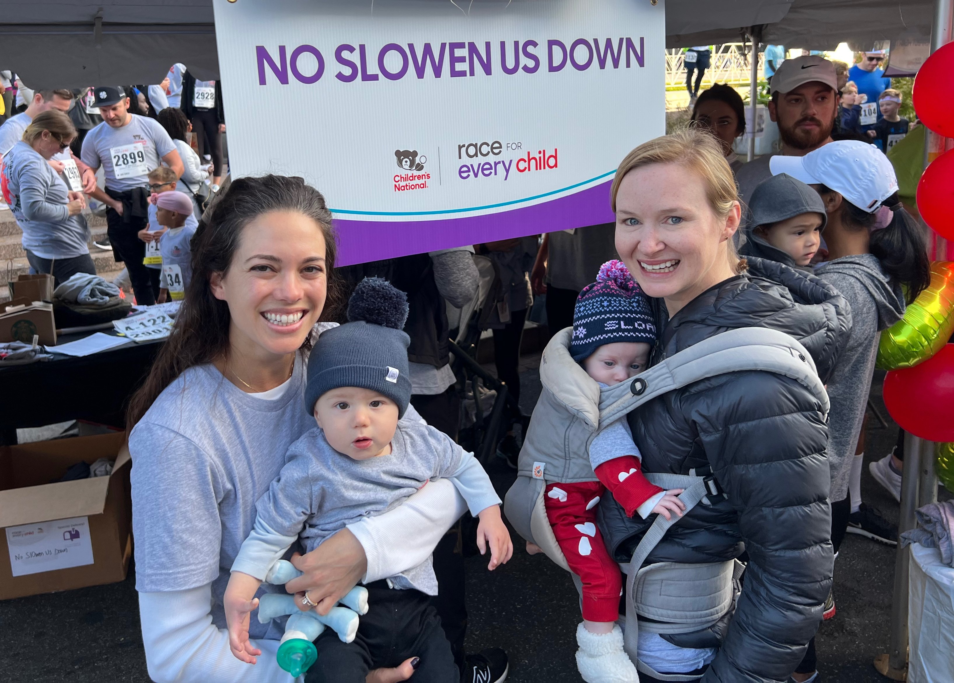 Patients Sloane and Owen with their families at the Race for Every Child.