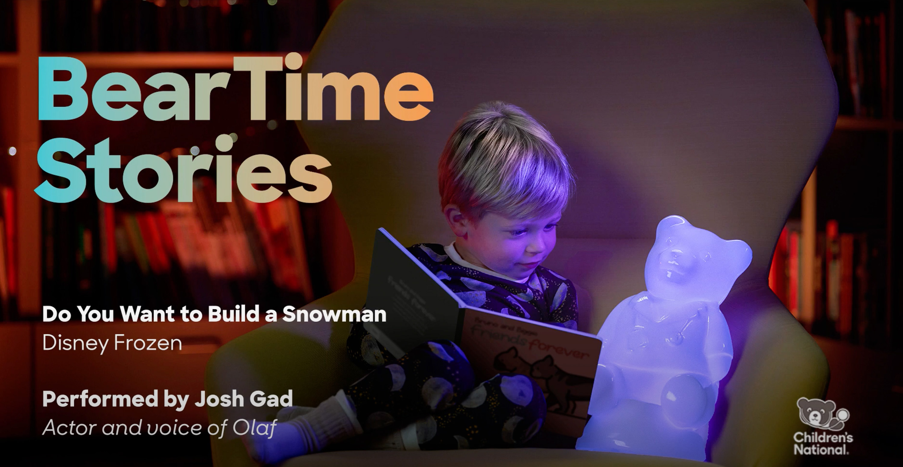 Image of a White male patient reading a bedtime story next to Light Up Dr. Bear