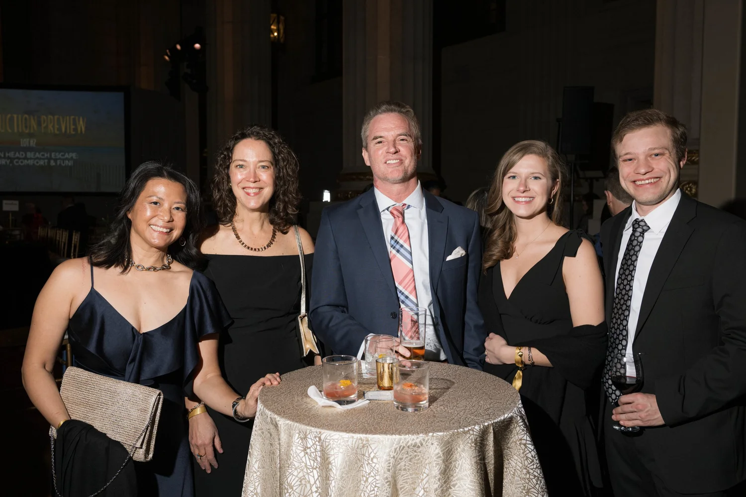 A group of A Vintage Affair 2025 event attendees smiling and posing for a photo.