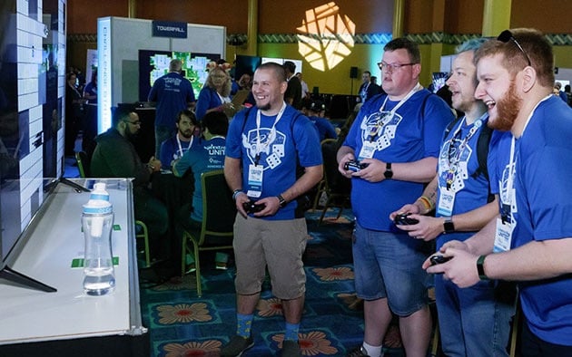 Four gamers enjoy video game play as they raise funds.