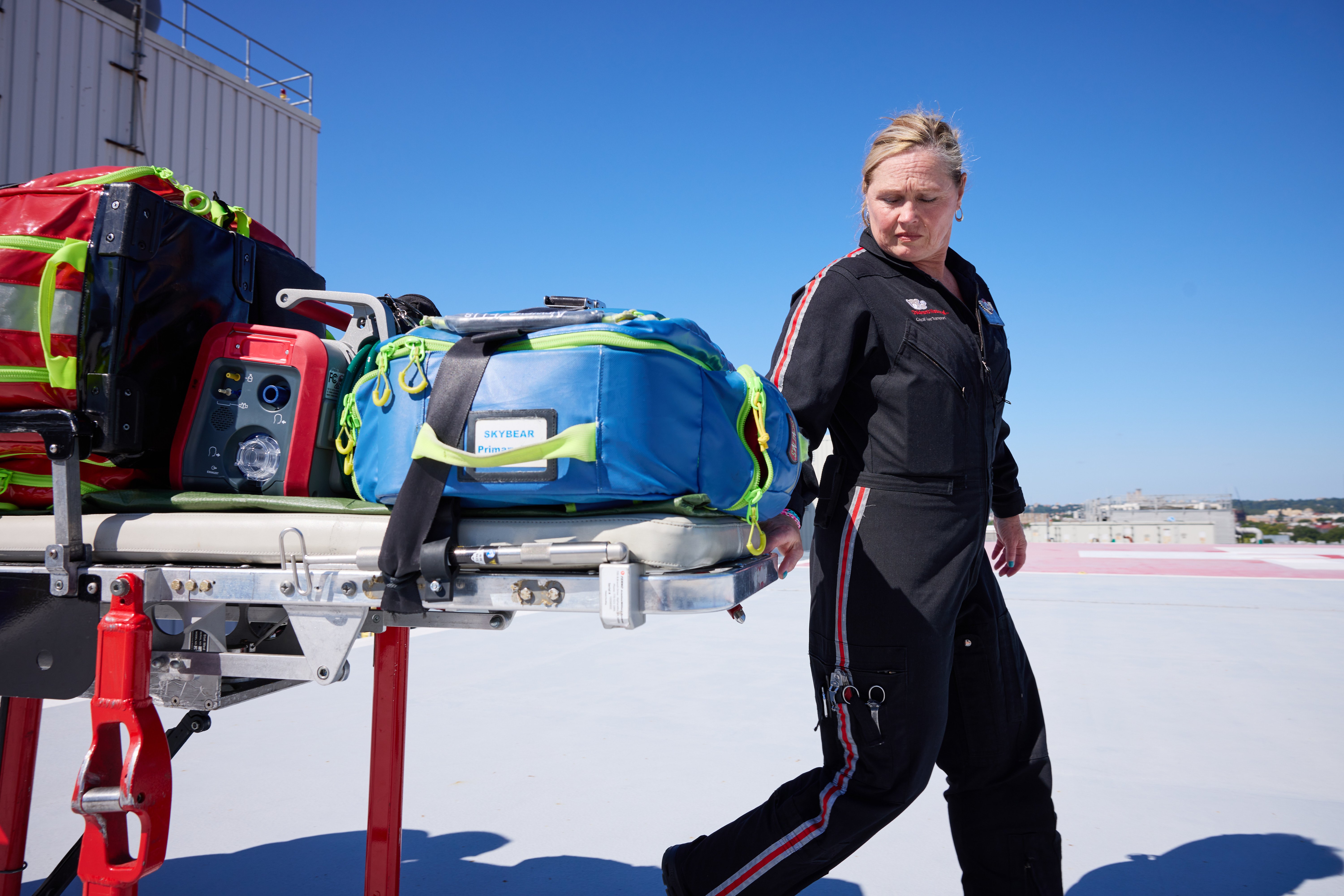 A member of the Children's National Transport Medicine team pulls equipment.