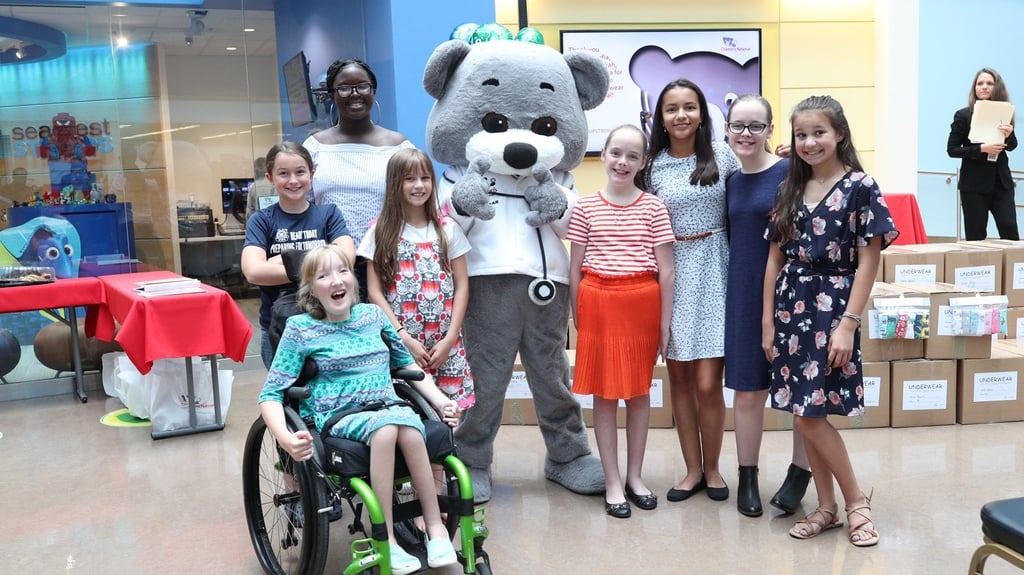 Dr. Bear with group of children