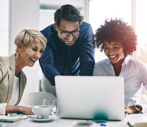 business people looking at laptop