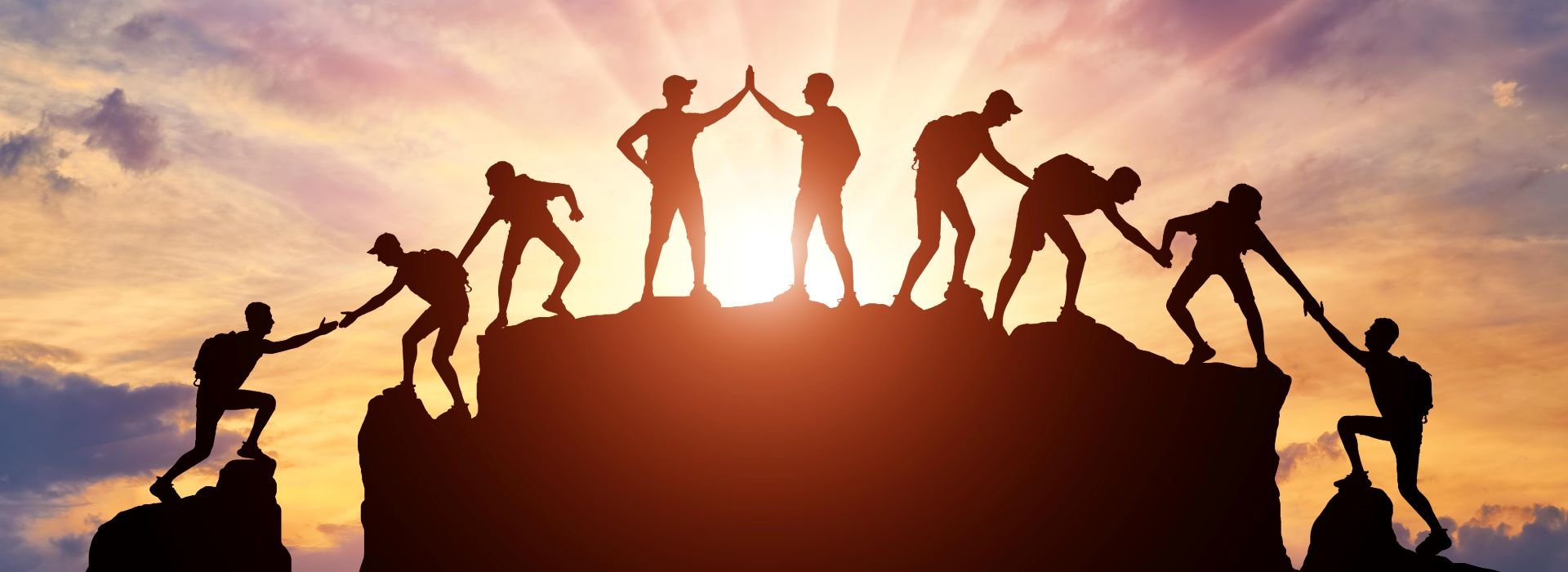 hikers climbing mountain