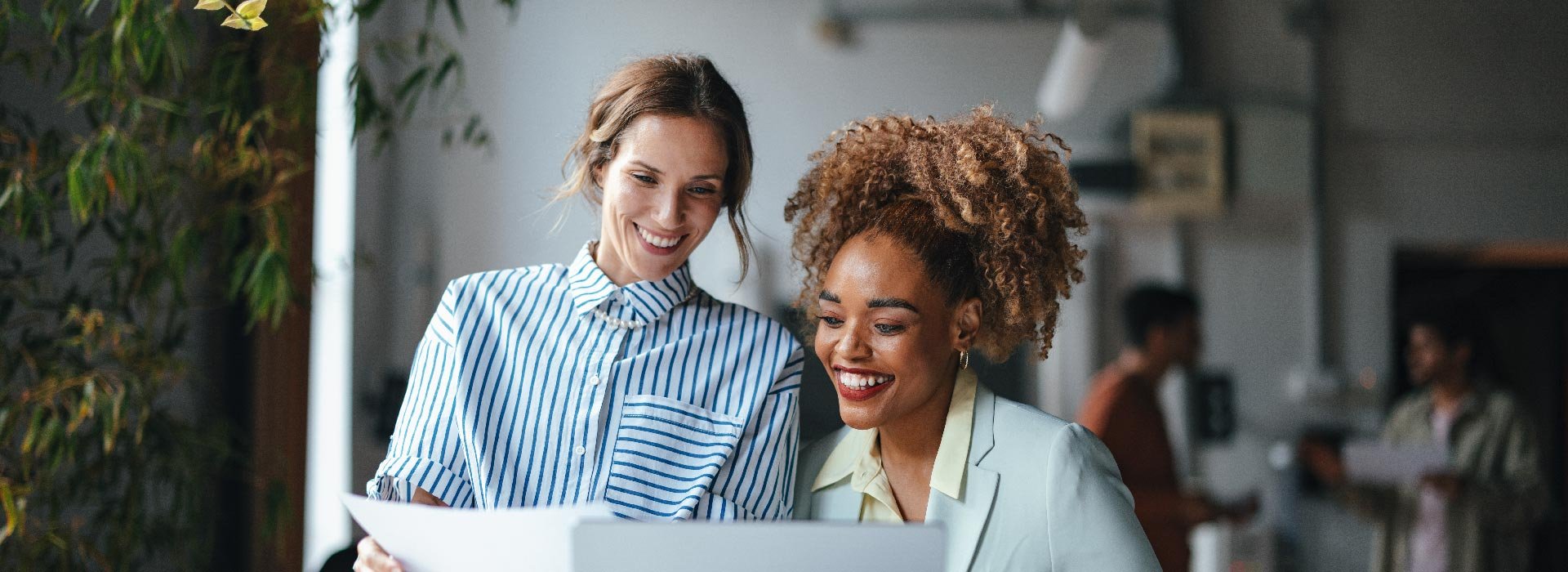 Two women smiling