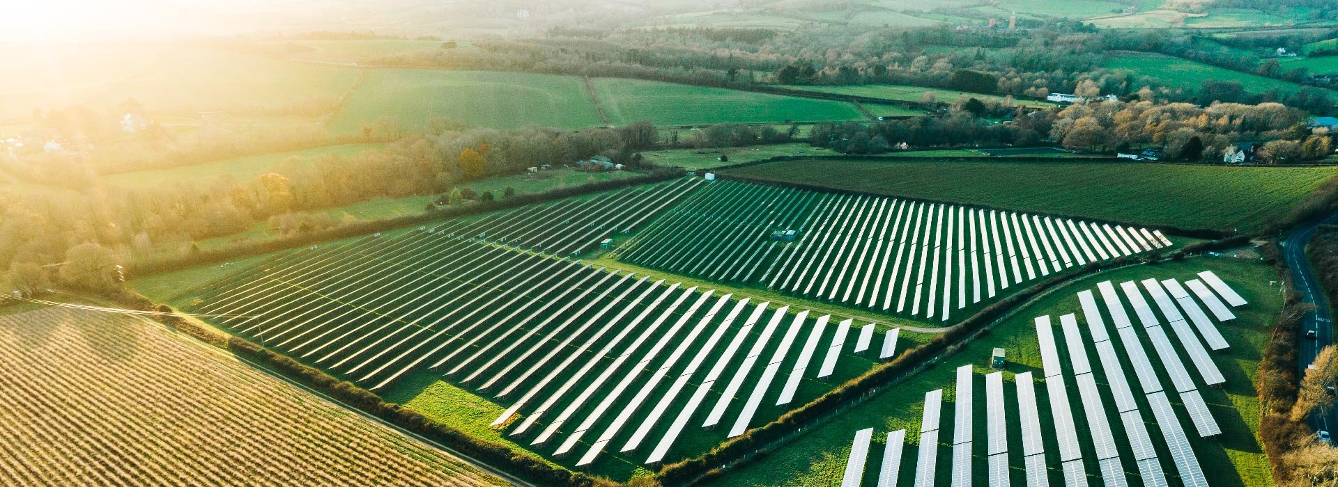 Green fields with solar panels