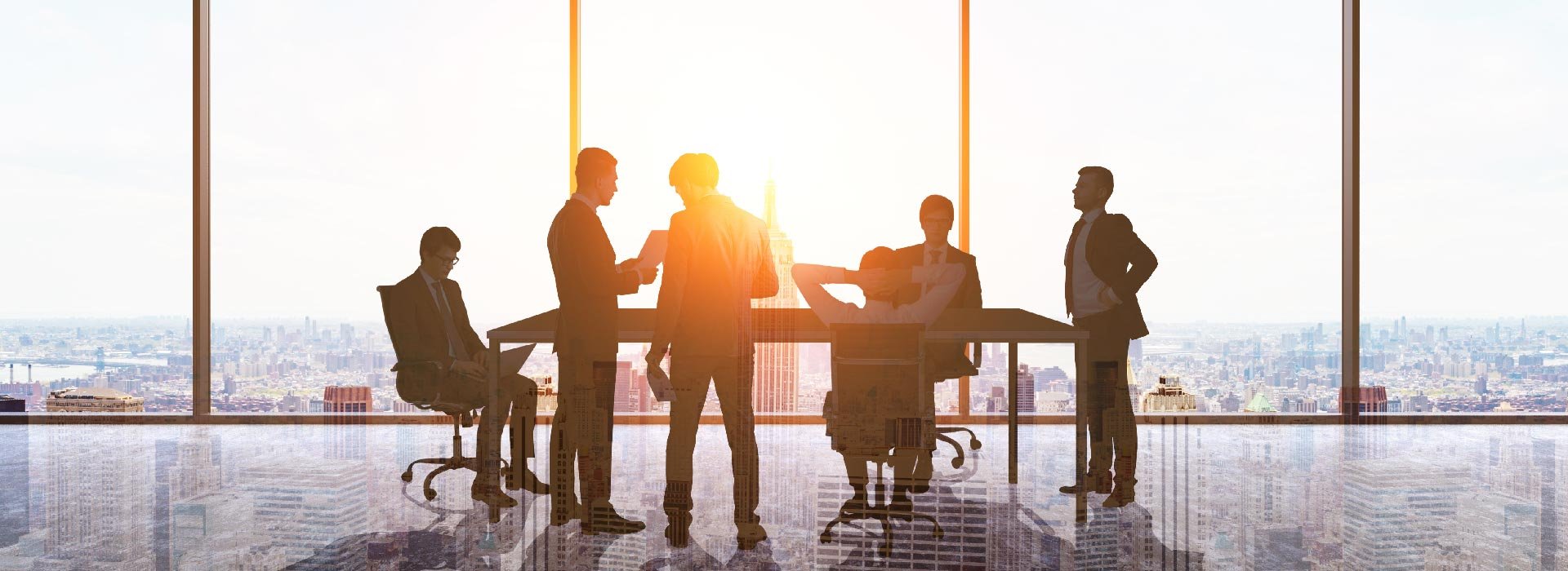 silouette of business people in building
