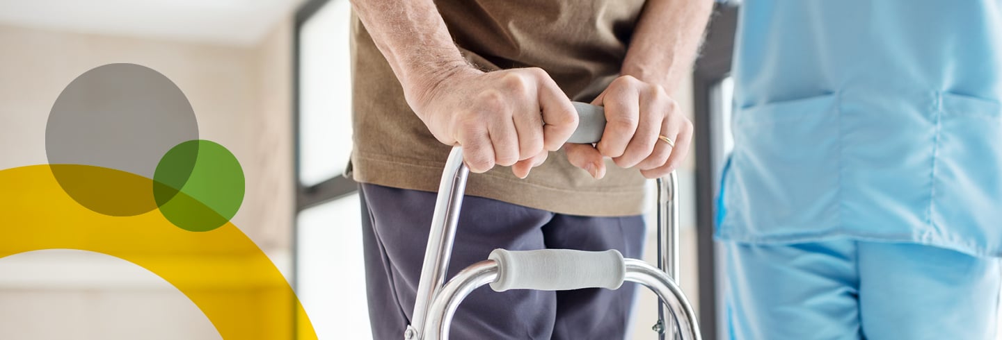 Patient using walker in hospital.