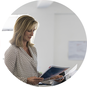 Customer looks through healthcare pamplet