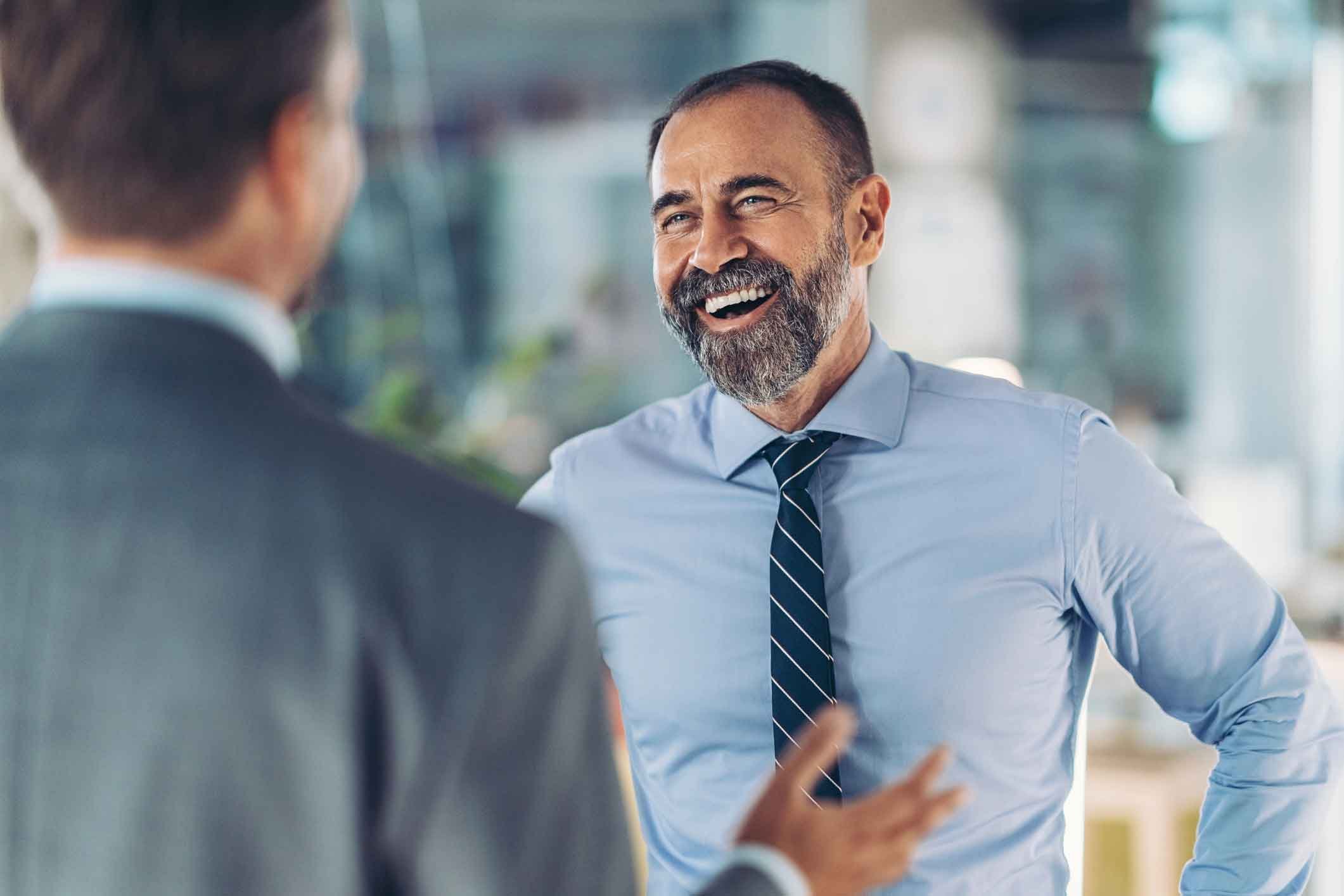 Two men in a meeting.
