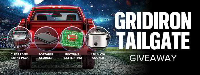 gridiron tailgate text next to a red truck