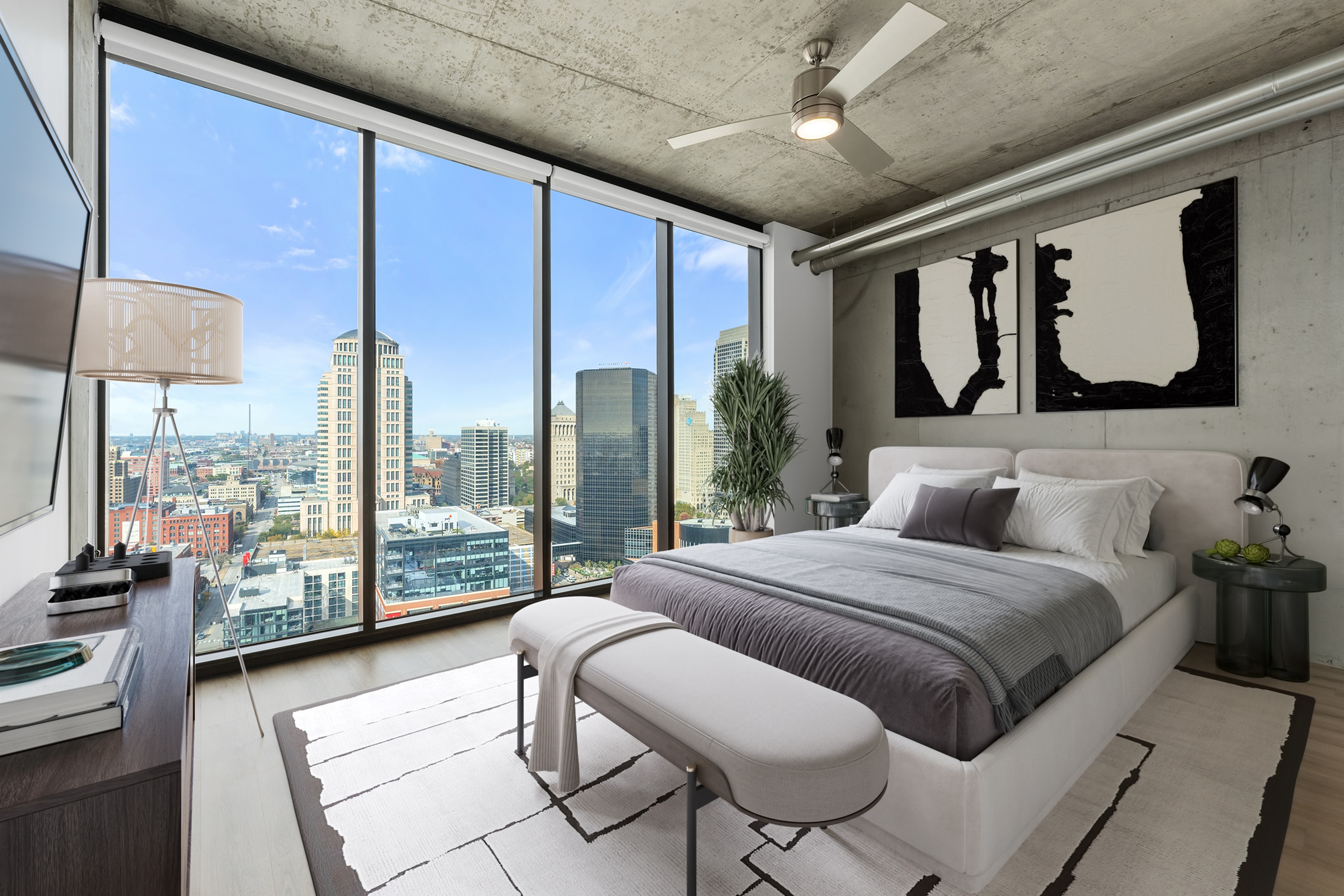 Modern apartment bedroom with floor to ceiling windows at One Cardinal Way