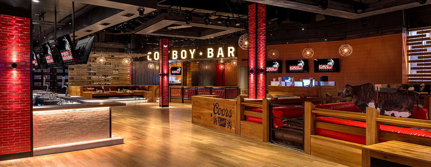 Architectural image of PBR Miami showing seating and TV screens.