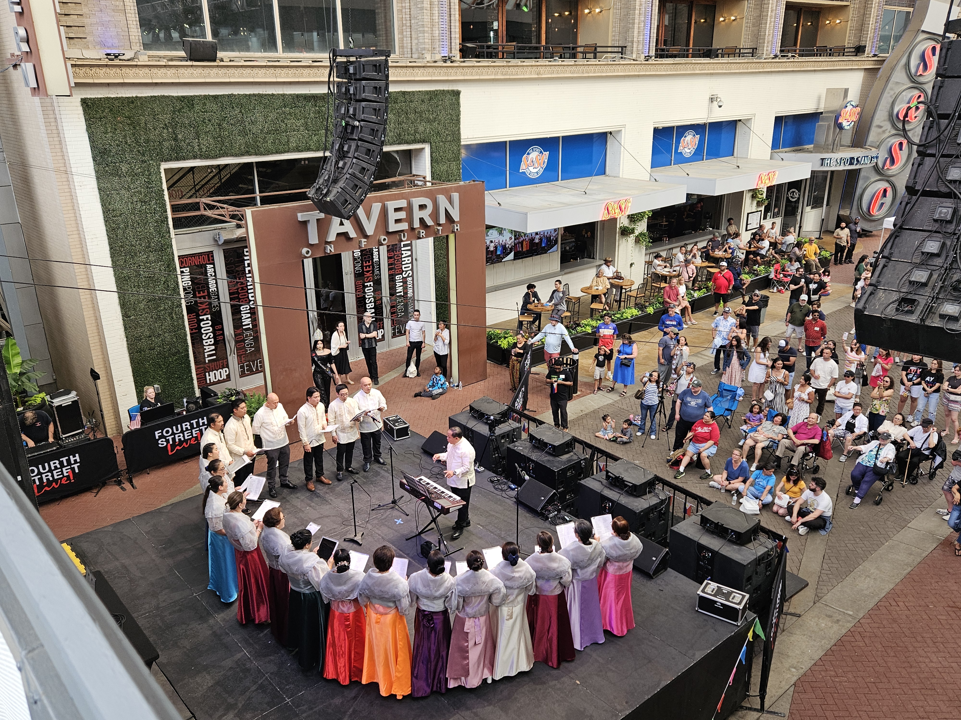 An image of dancers on stage at the Philippines Independence Day Festival.
