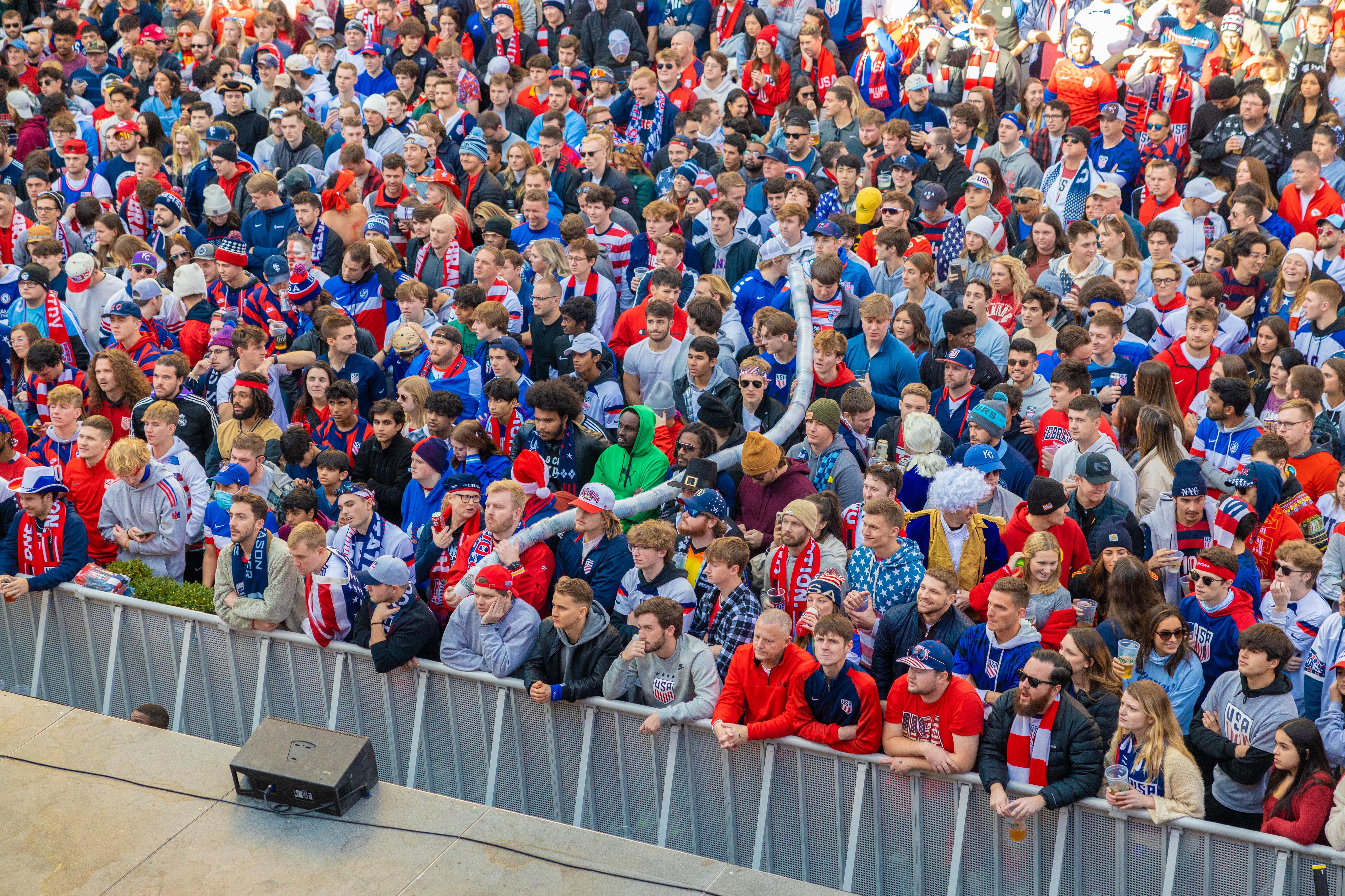 An image of a crowd of USA fans watching soccer.