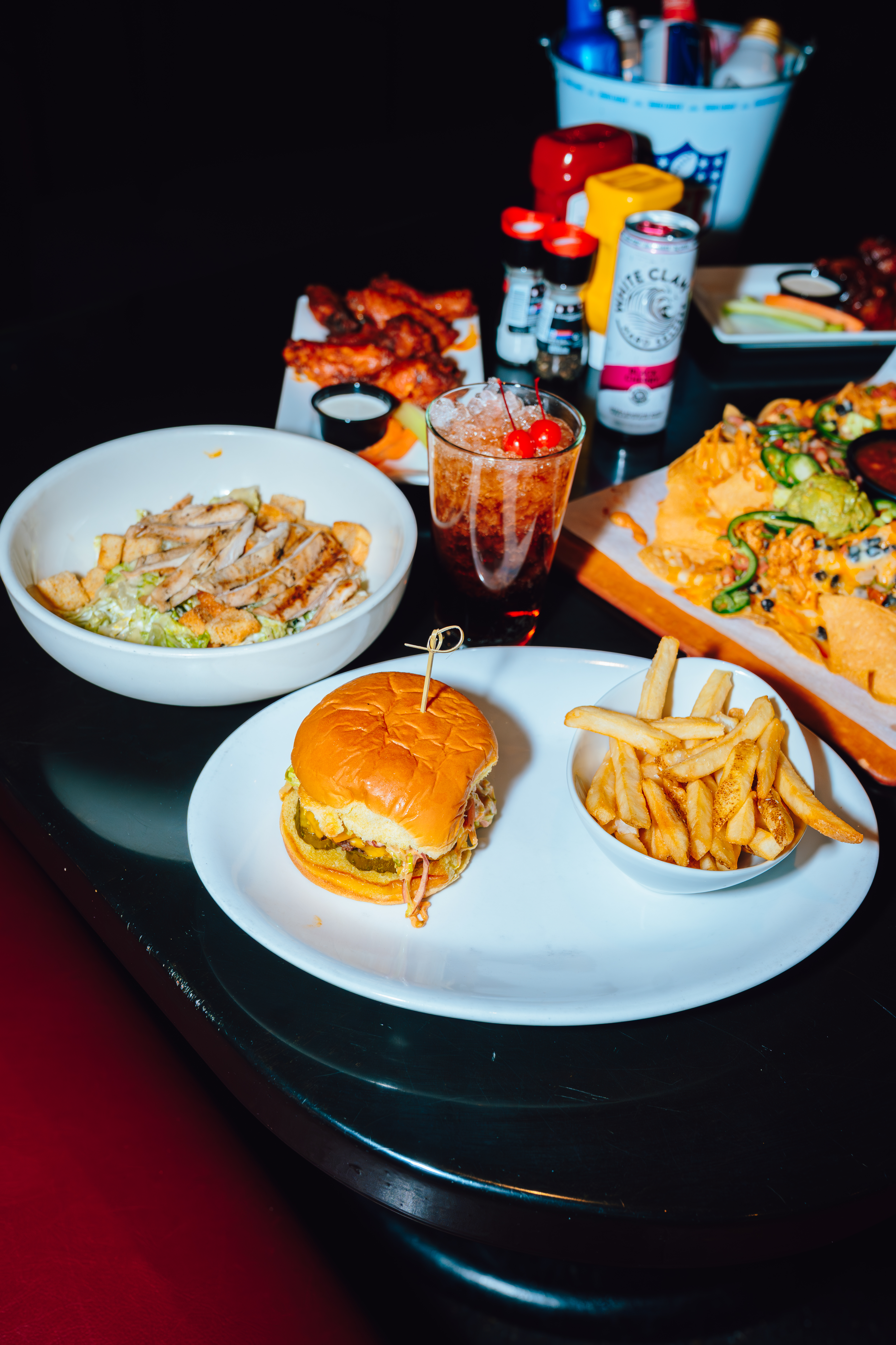 An image of dishes at SSC, such as a burger, fries, and a salad.