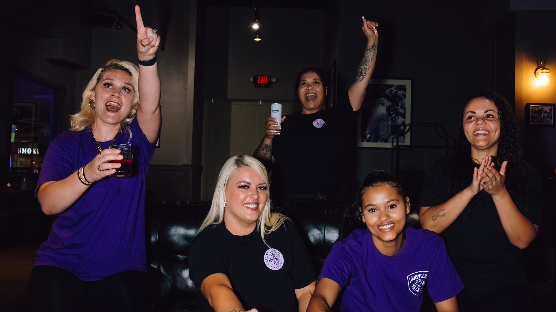 An image of people cheering.