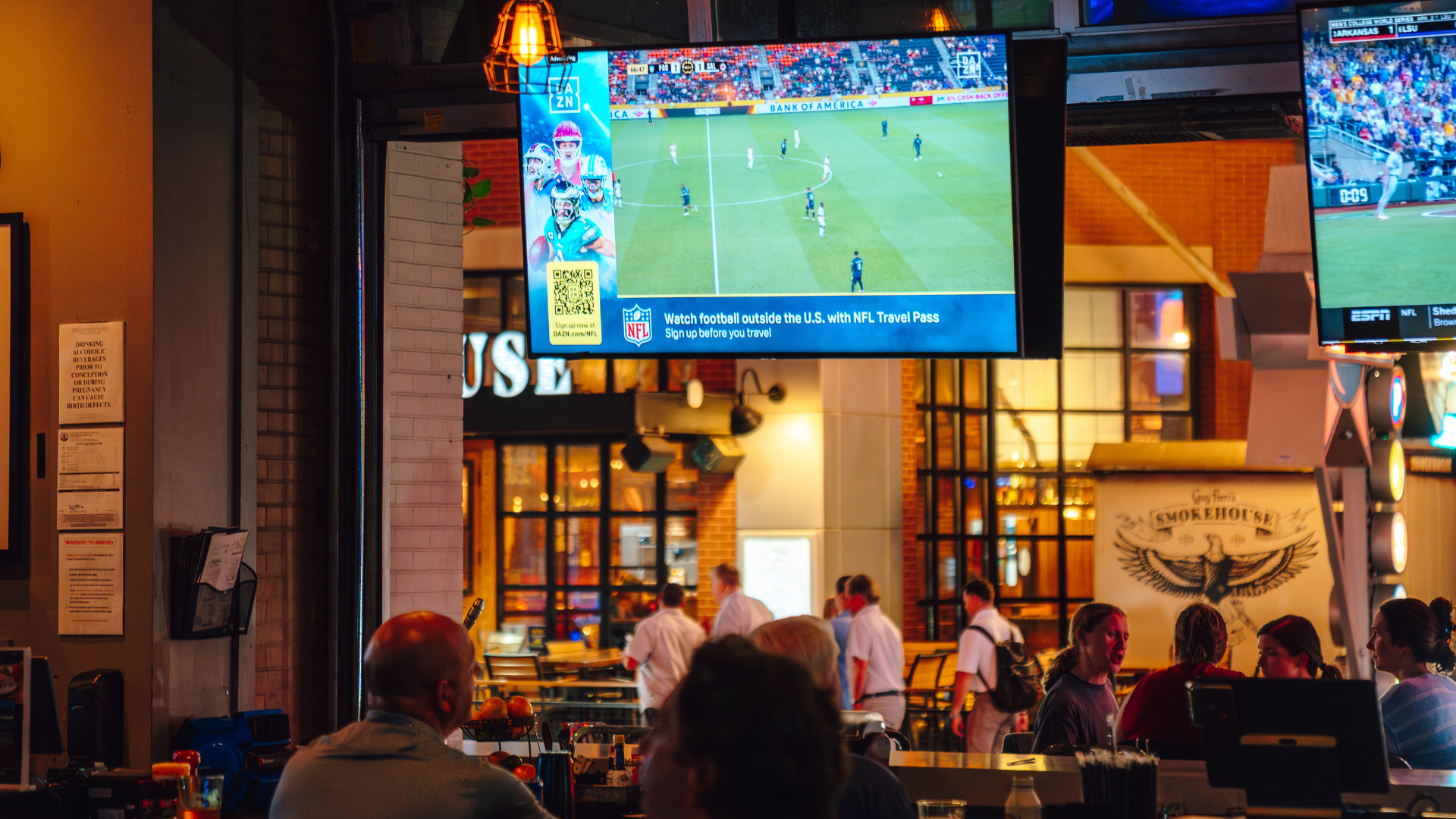 Image of people watching soccer in Sports and Social