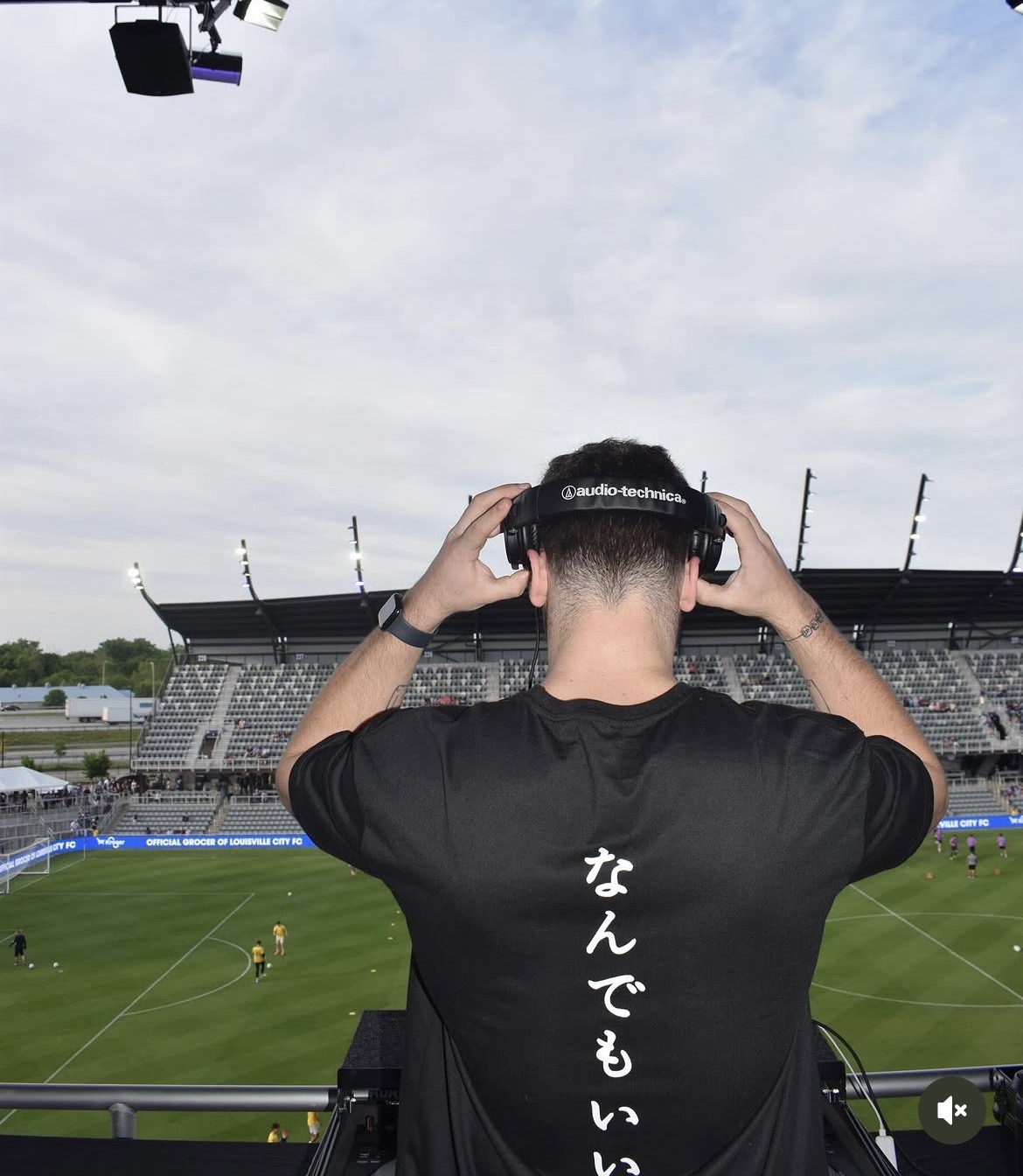 An image of a dj at the Lou City Stadium.