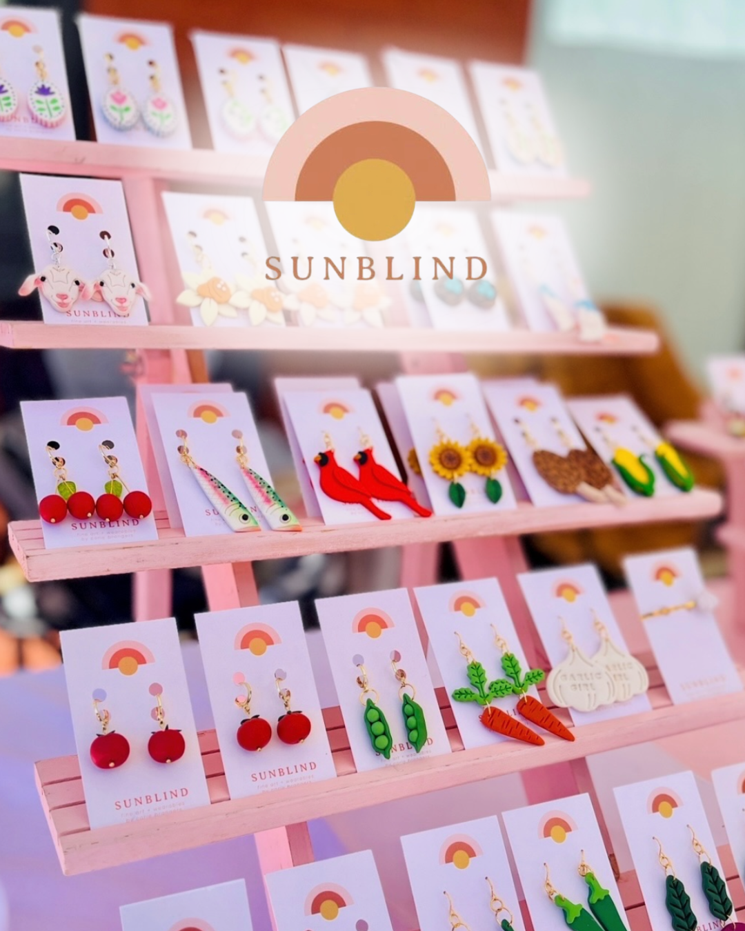 An image of some earrings on display from Sunblind Jewelry.