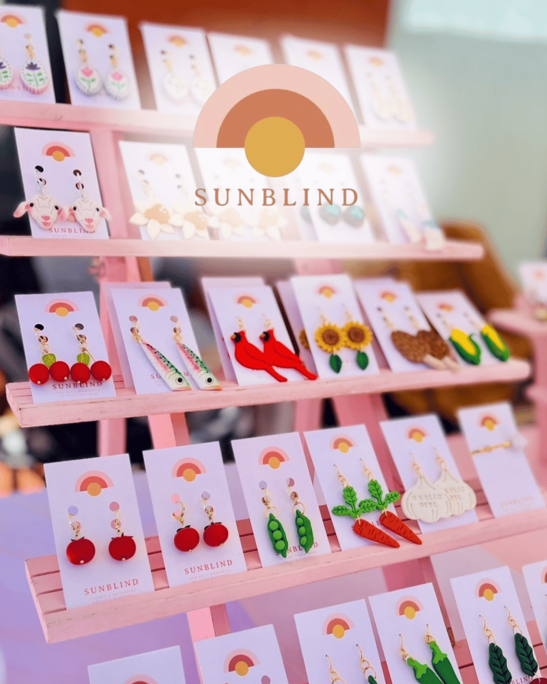 An image of some earrings on display from Sunblind Jewelry.