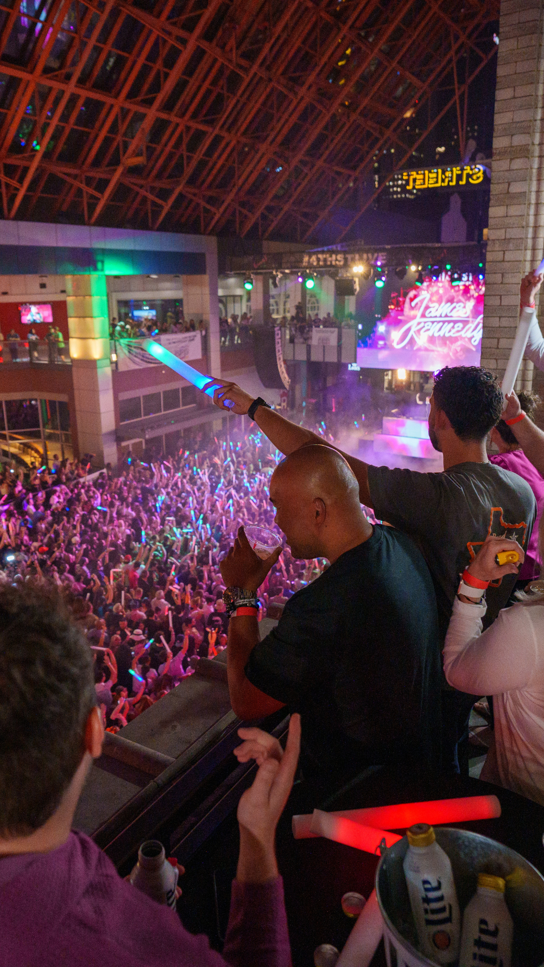 An image of people enjoying a concert from the Tavern balcony.