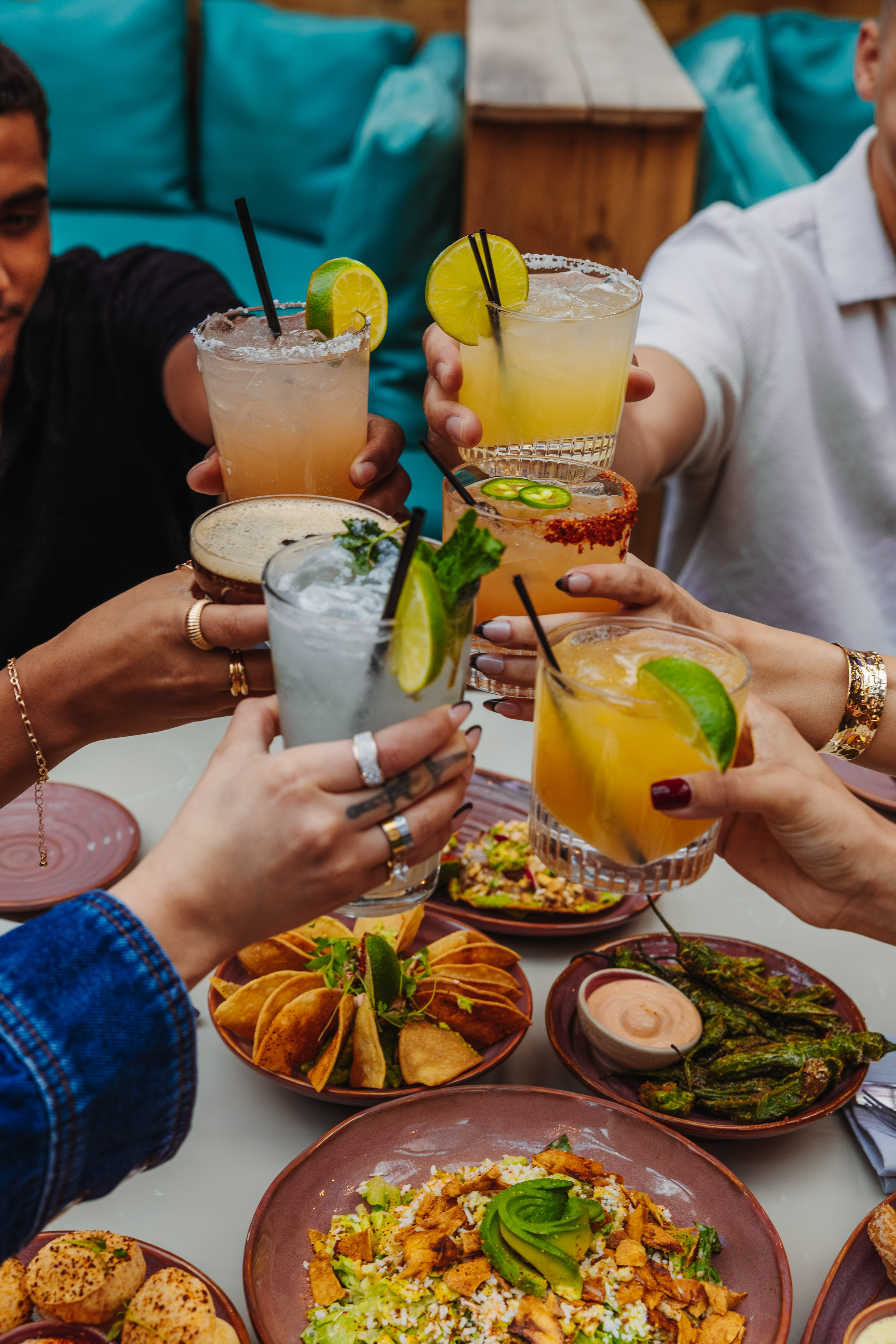 Vibrant happy hour drinks at Besos y Abrazos.