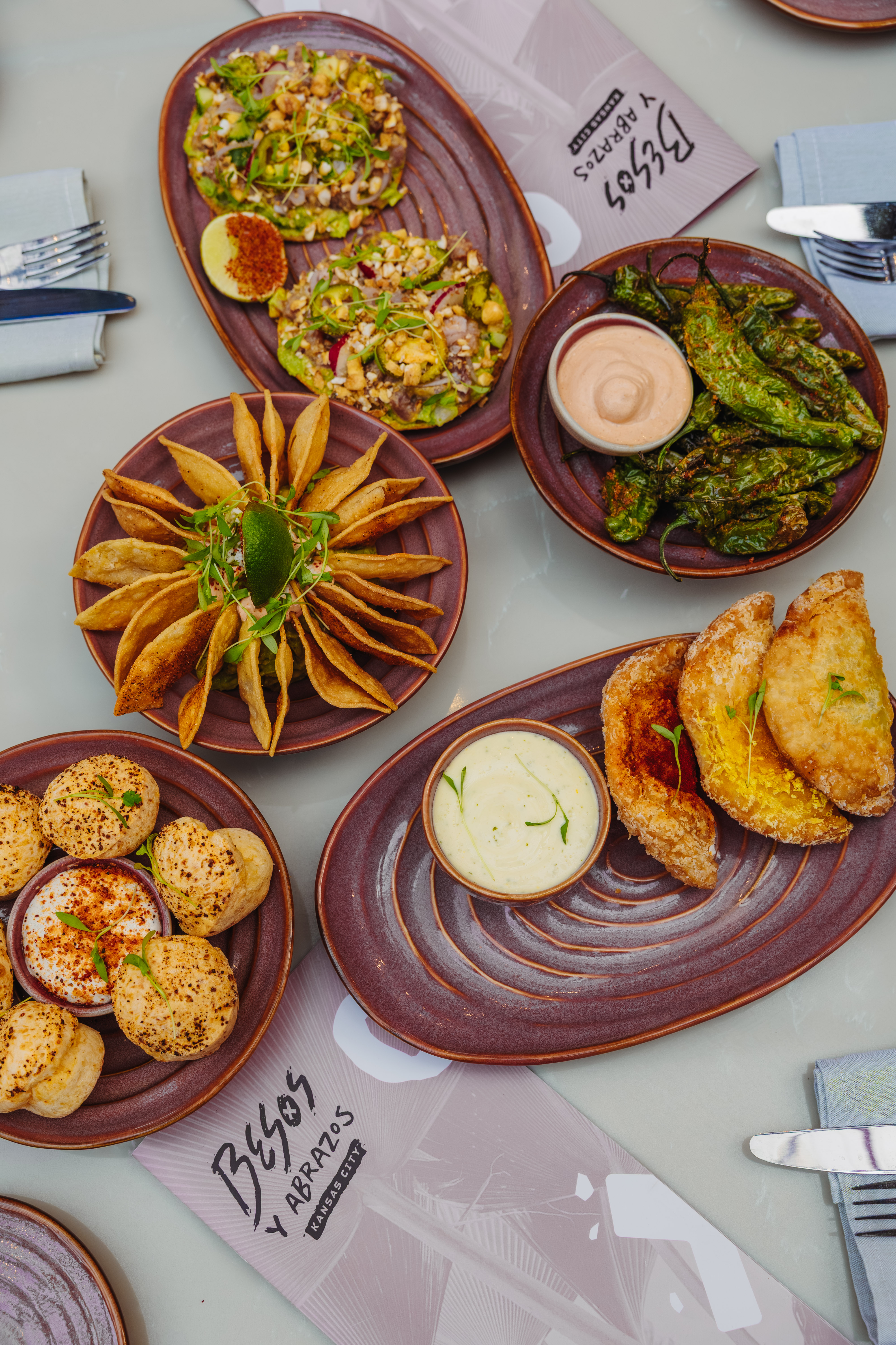 A table full of delicious shareables at Besos y Abrazos.