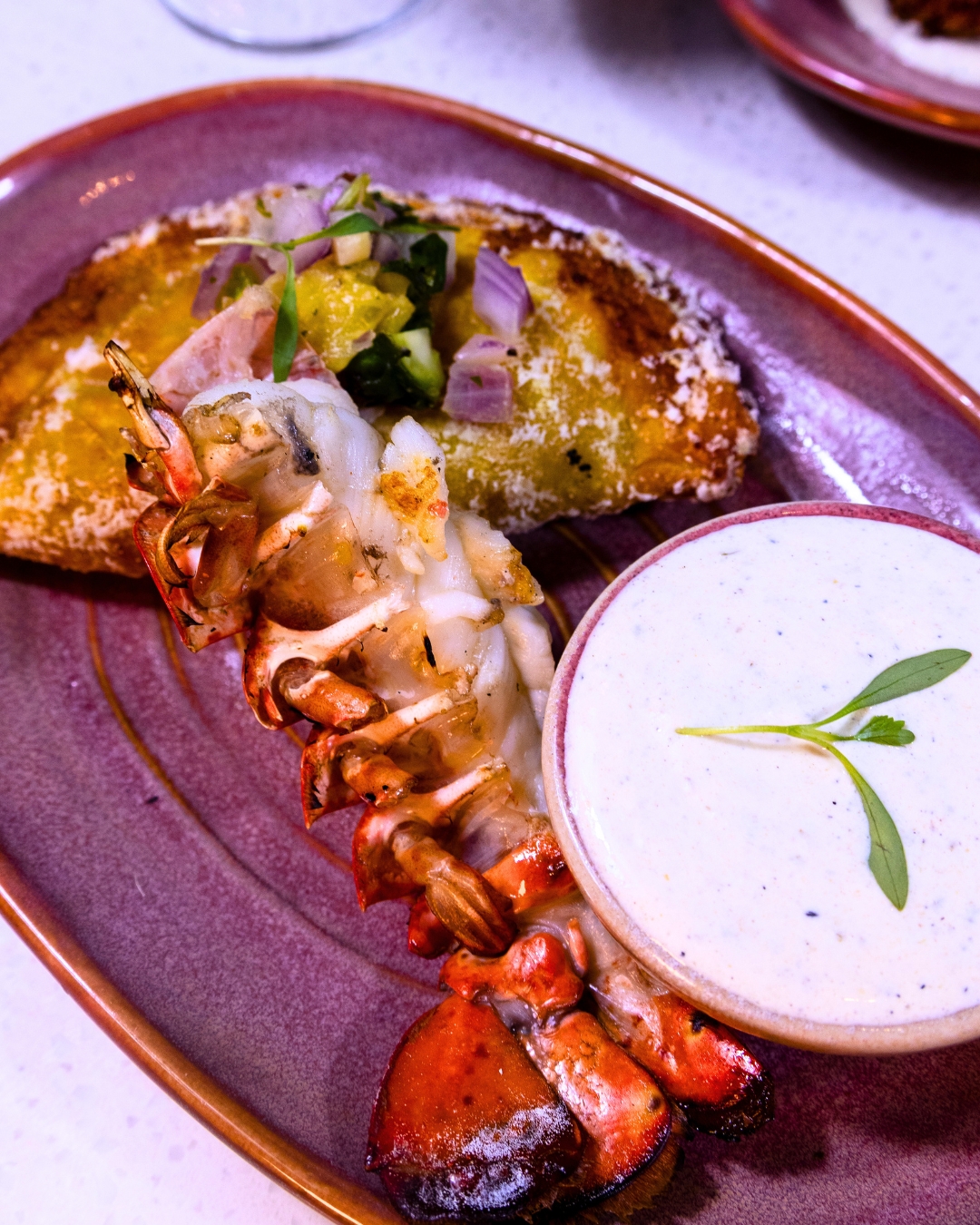 Besos Lobster Al Pastor Empanada.