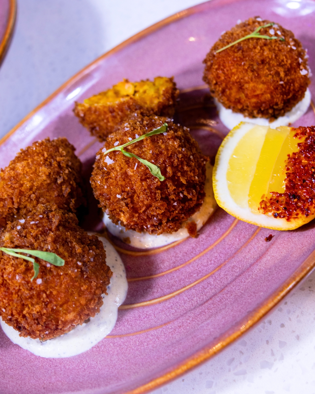 Besos Smoked Salmon Arancini. 