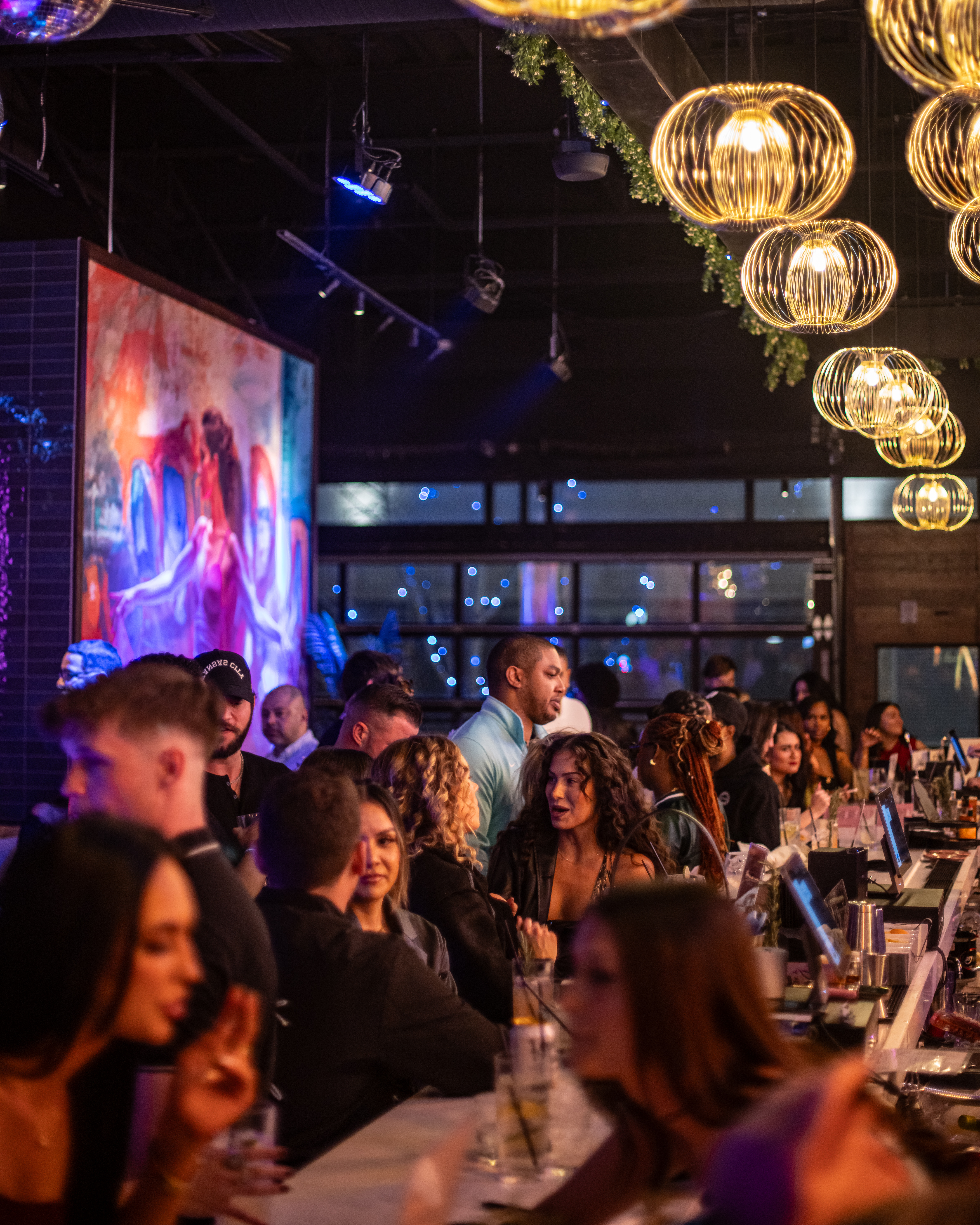 Lively crowd at Besos for XOXO Thursday.