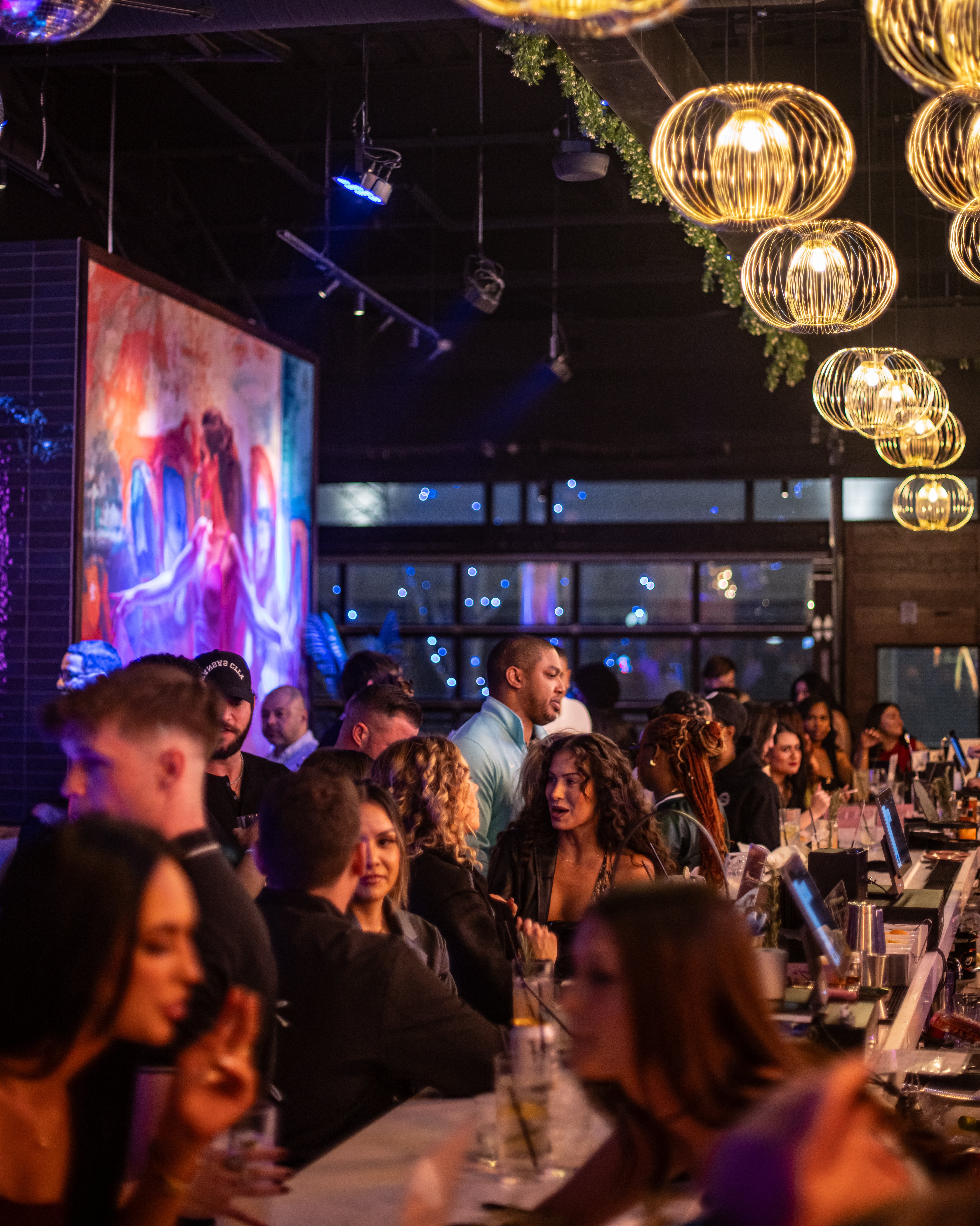 Lively crowd at Besos for XOXO Thursday.