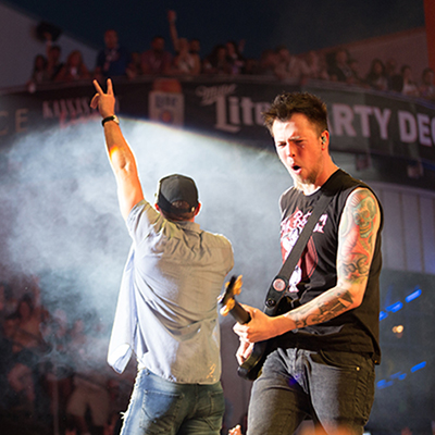 KC Live - - Band playing on stage