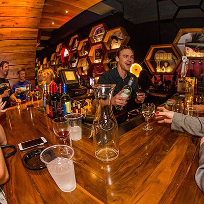 Indie on Main - View of the bartender serving drinks