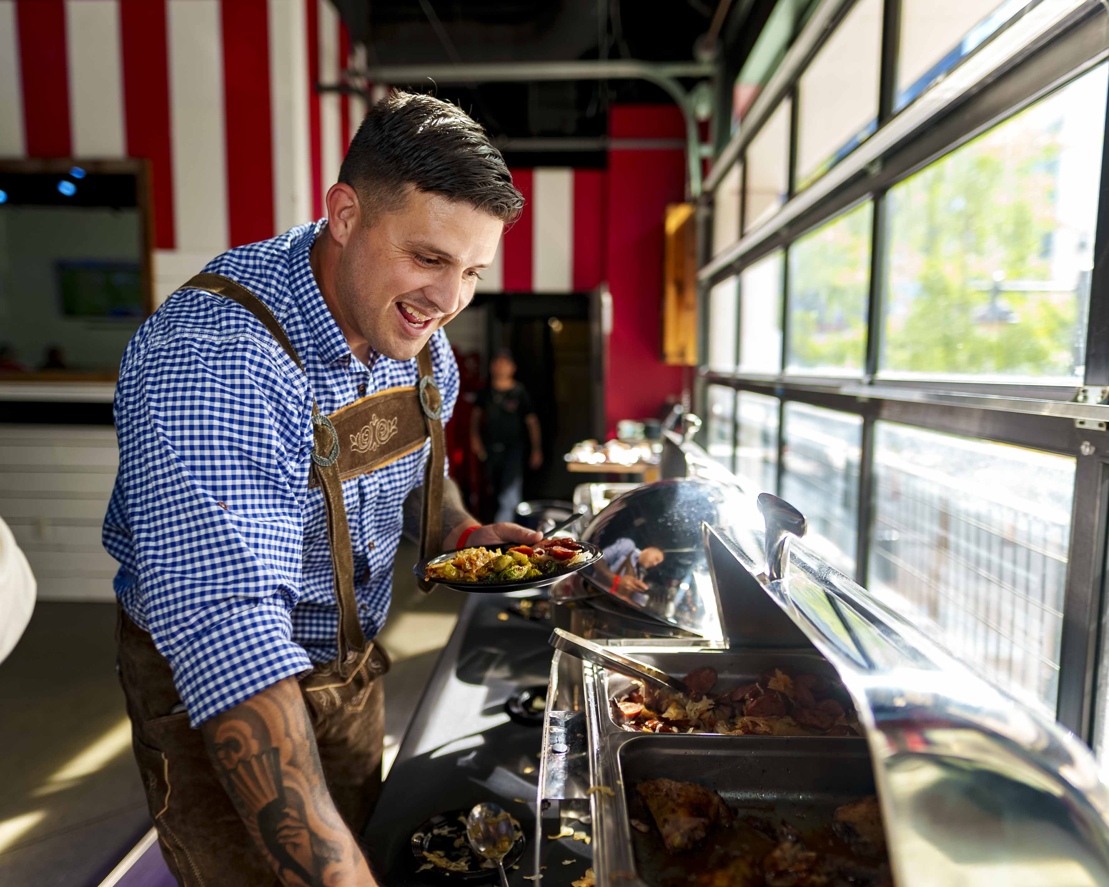 Oktoberfest Live attendee at German Food Buffet